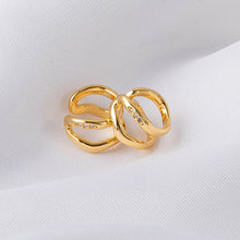 Load image into Gallery viewer, Irregular ear bone clips plated with real gold and studded with diamonds