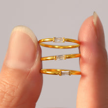 Load image into Gallery viewer, A rectangular stainless steel ring plated with 18K gold and set with a fine zircon ring