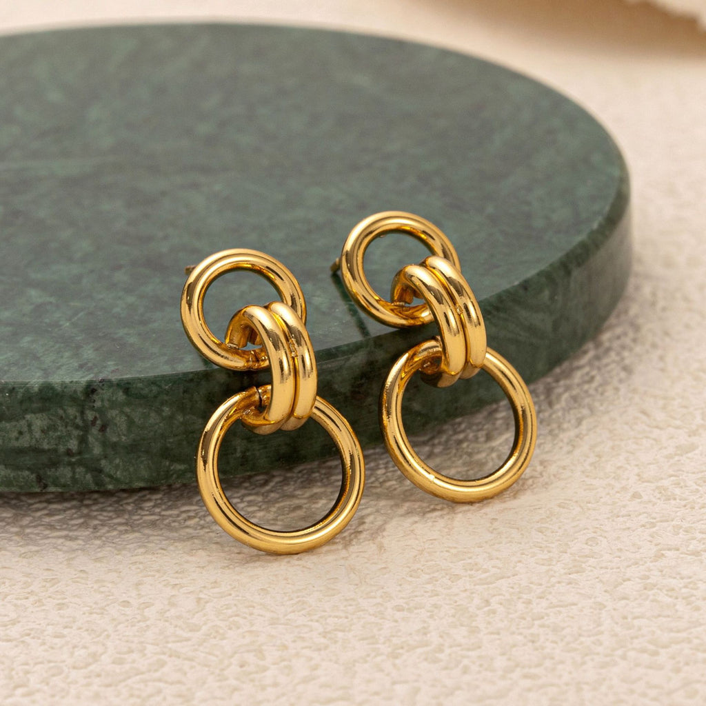 Stainless steel perforated circular earrings