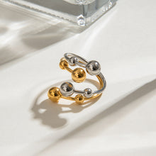Load image into Gallery viewer, A double-layer ring made of stainless steel, gold and silver, with large and small steel balls