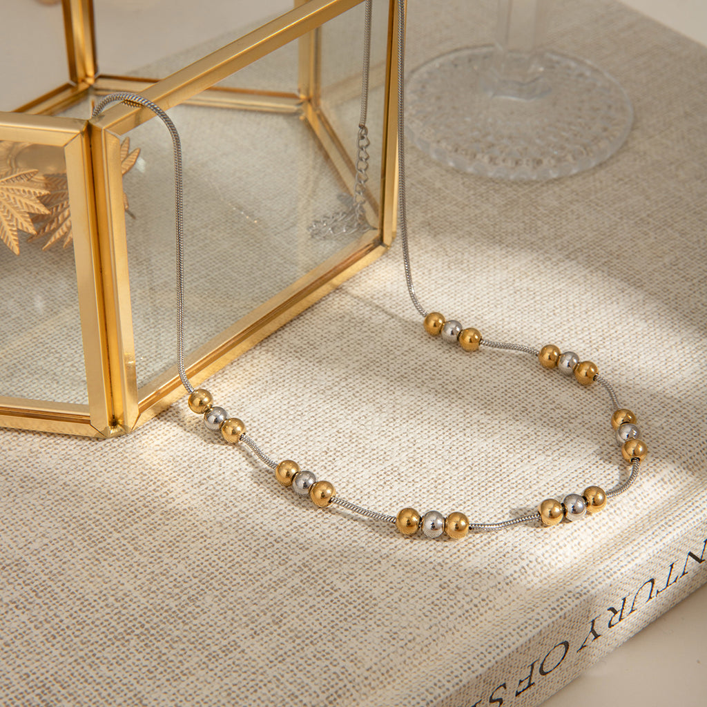 Stainless steel gold bead color-matched necklace