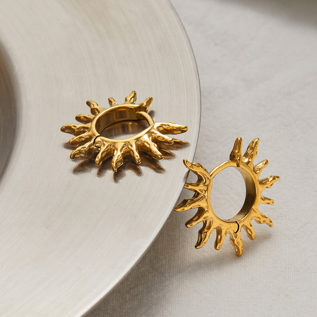 Golden stainless steel sunflower hollowed-out earrings