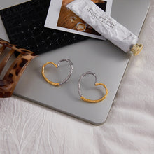 Load image into Gallery viewer, Gold and silver color-matched stainless steel heart-shaped exaggerated ear studs