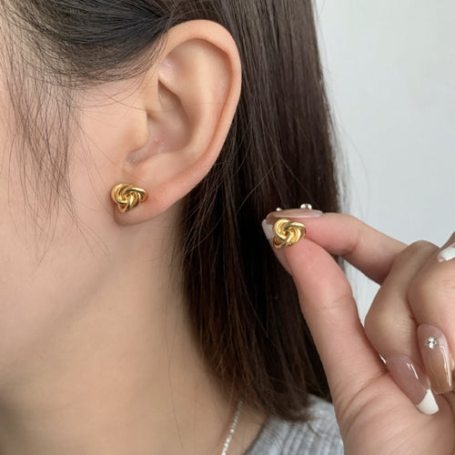 Tie a pair of S925 sterling silver knots around the twisted ear studs