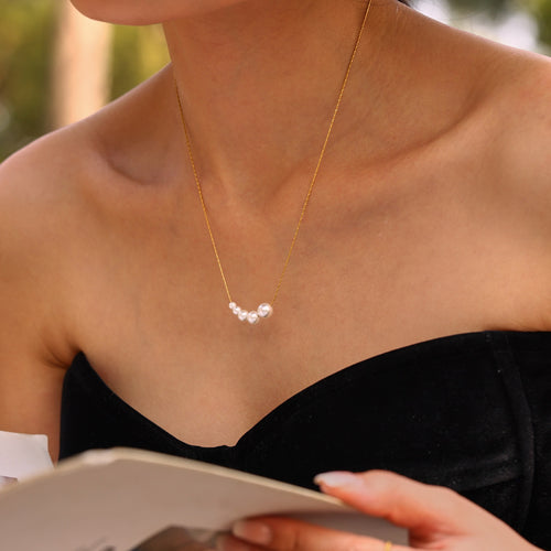 A golden stainless steel beaded necklace