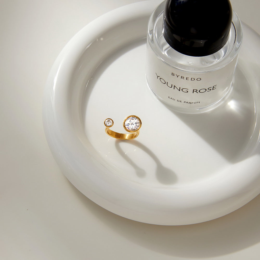 A golden stainless steel zircon ring