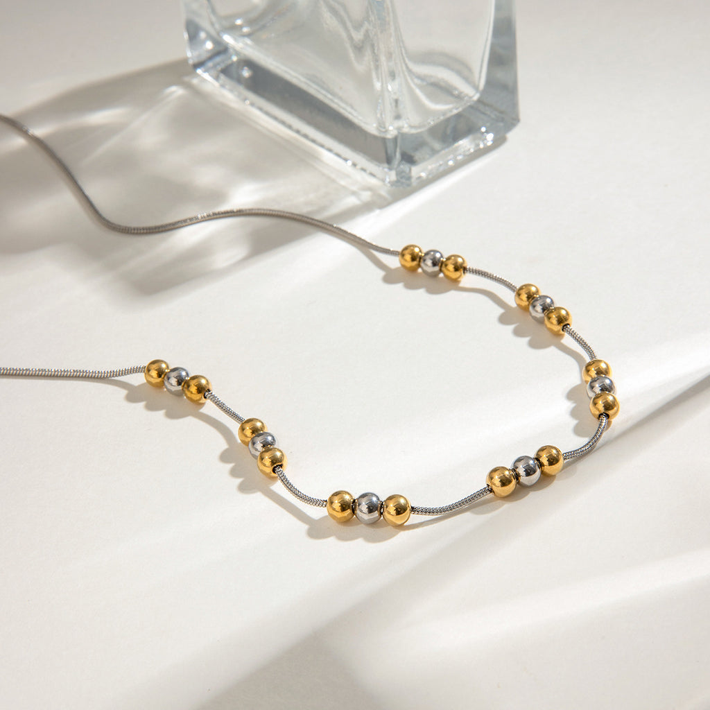 Stainless steel gold bead color-matched necklace