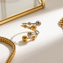 Load image into Gallery viewer, A double-layer ring made of stainless steel, gold and silver, with large and small steel balls