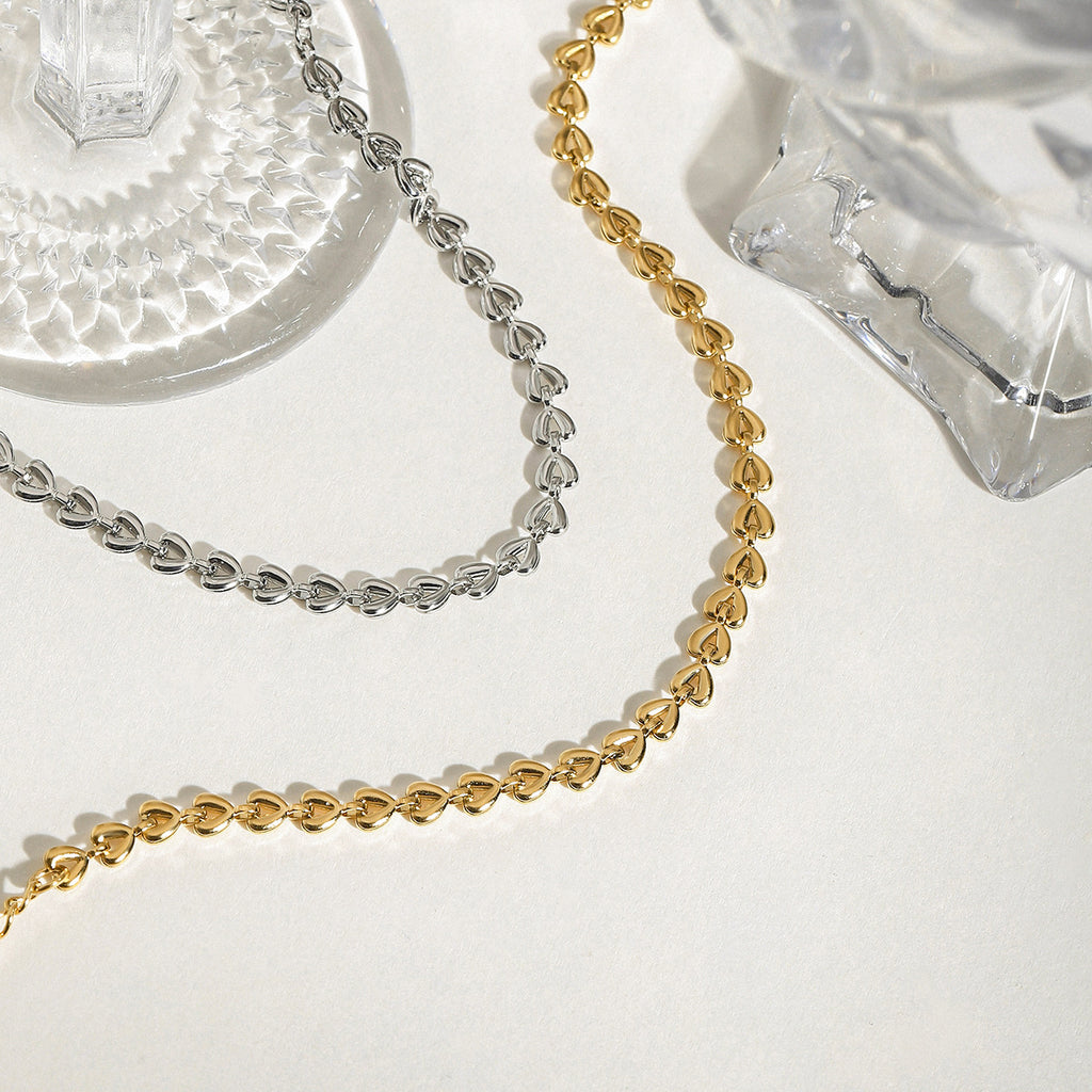Stainless steel golden steel color hollow heart woven bracelet