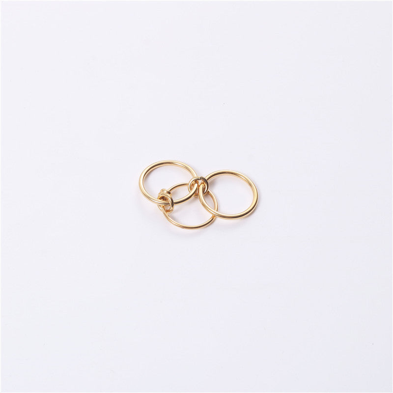 A golden three-ring ring