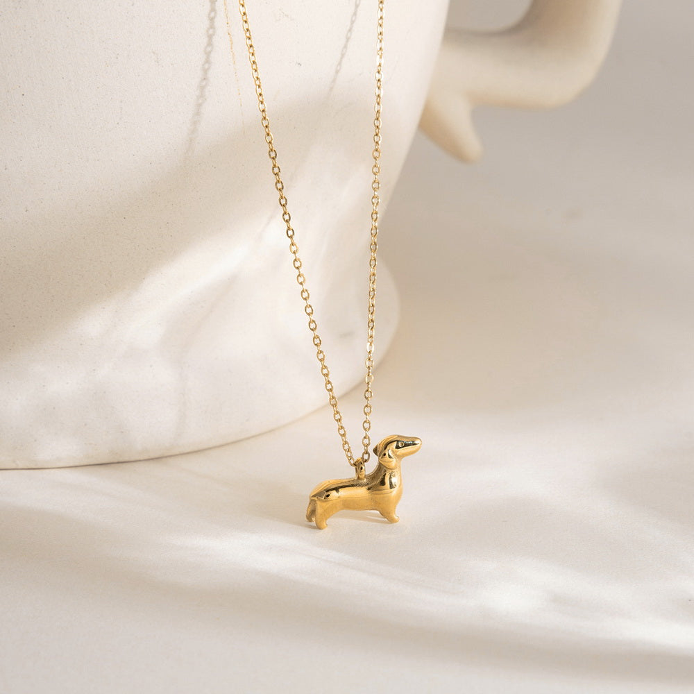 A cute golden stainless steel dog pendant necklace