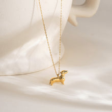 Load image into Gallery viewer, A cute golden stainless steel dog pendant necklace