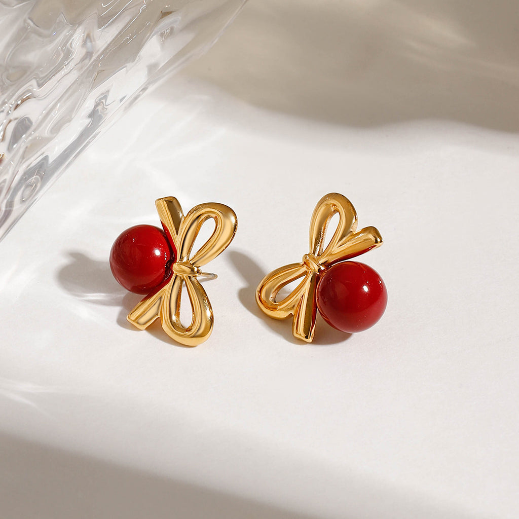 Stainless steel red glass bead bow earrings