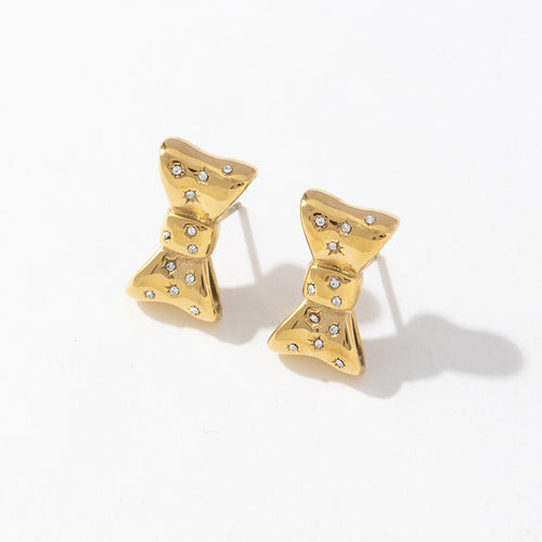 Stainless steel earrings plated with 18K gold bow and slightly set with zircon