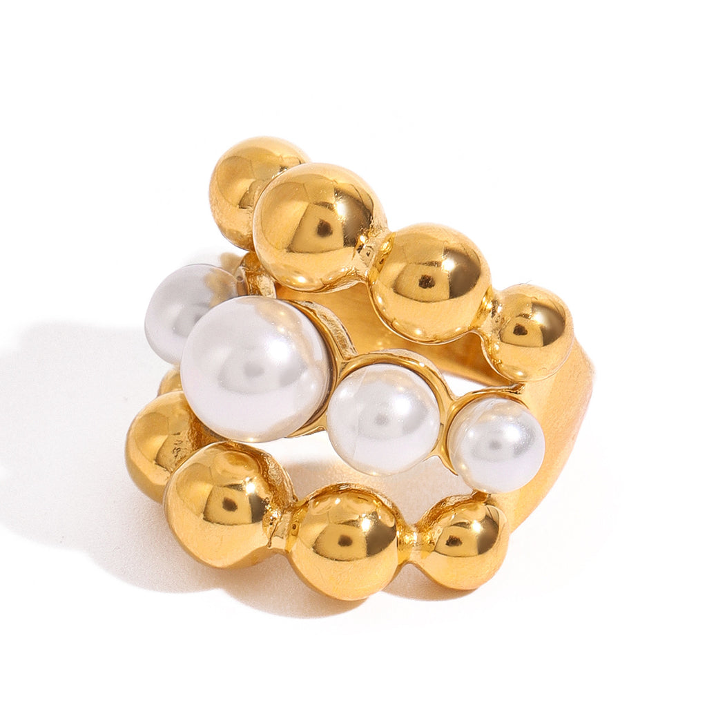 A golden stainless steel pearl round bead three-layer ring