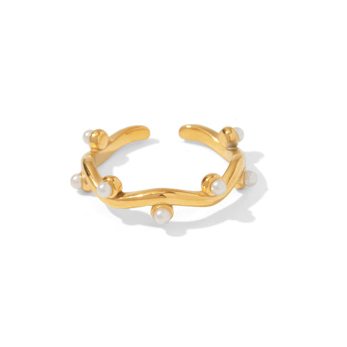 An 18K gold-plated stainless steel ring set with white pearls