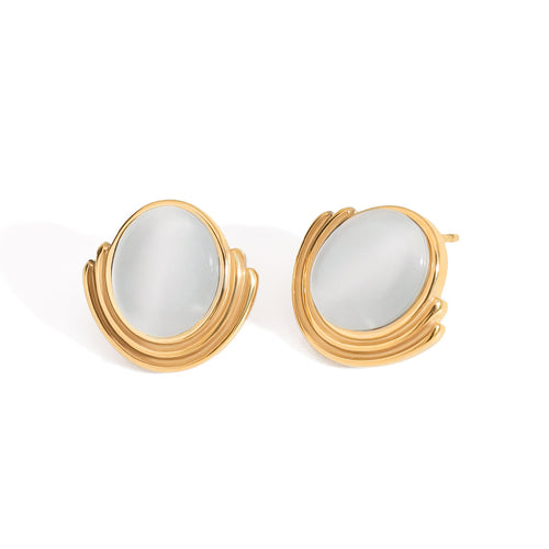 A pair of stainless steel cat-eye stone stud earrings