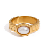 Stainless steel ring set with pearls