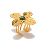 A stainless steel flower ring with a natural stone opening
