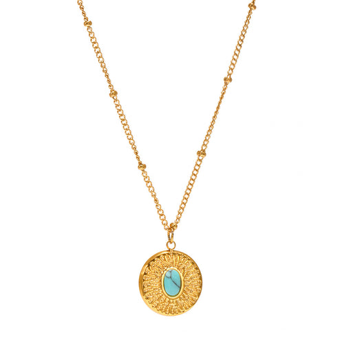 A stainless steel geometric circular karst-patterned turquoise pendant necklace