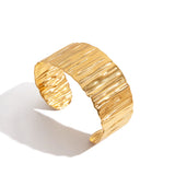 Golden stainless steel wide-faced bracelet