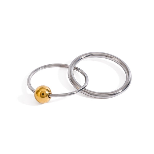 A stainless steel gold and silver color-matched double-ring ring