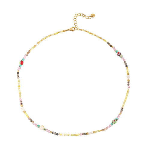 A hand-beaded necklace made of colored natural stone pearls