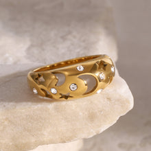 Load image into Gallery viewer, A stainless steel ring with diamond-encrusted and hollowed-out stars and moons