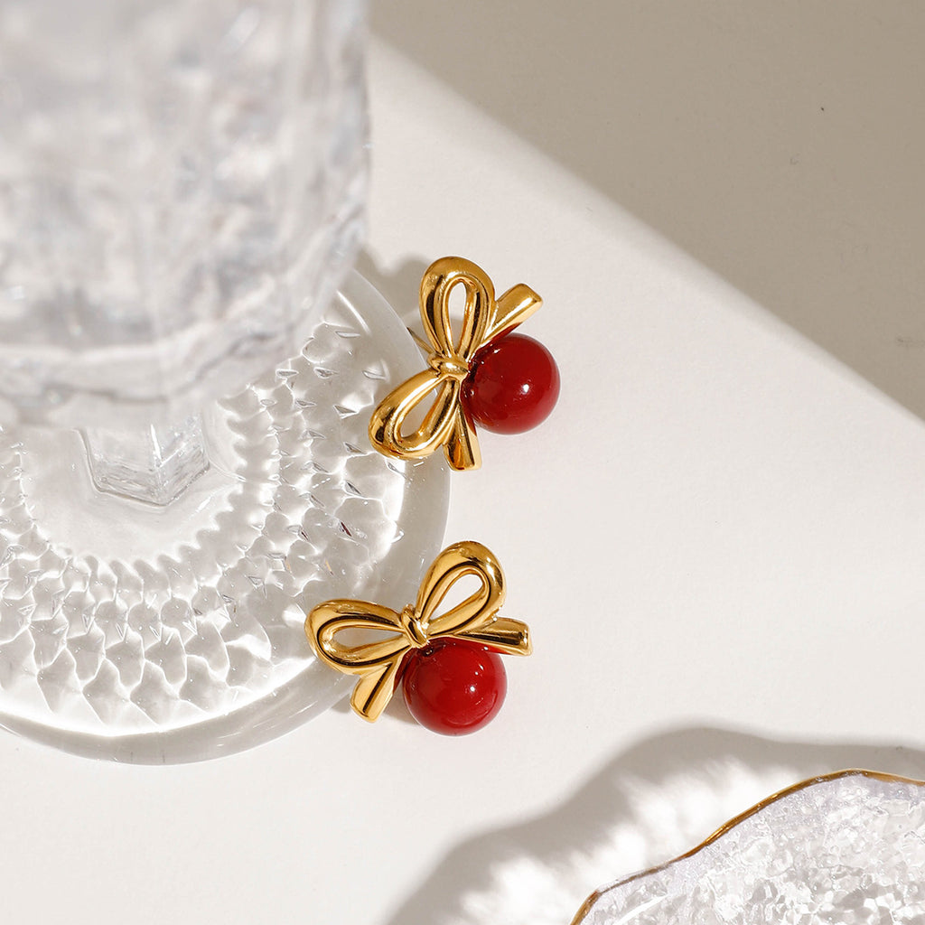 Stainless steel red glass bead bow earrings