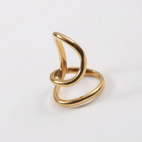 A stainless steel 18K gold ring with geometrically twisted lines
