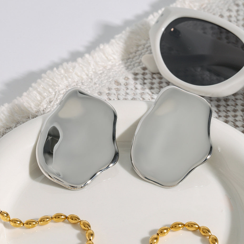 Exaggerated large polished stainless steel earrings