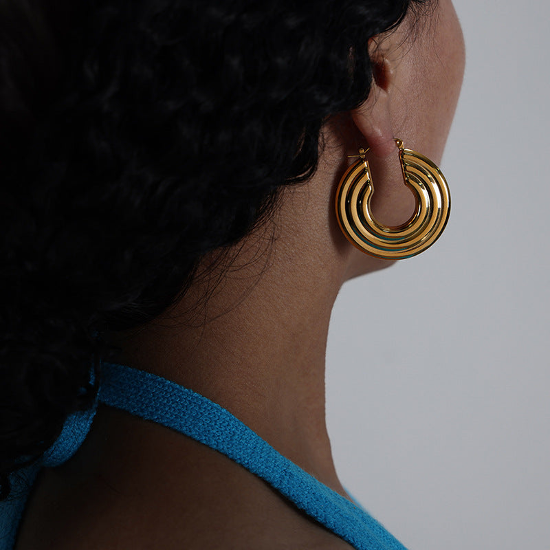 Stainless steel textured circular earrings