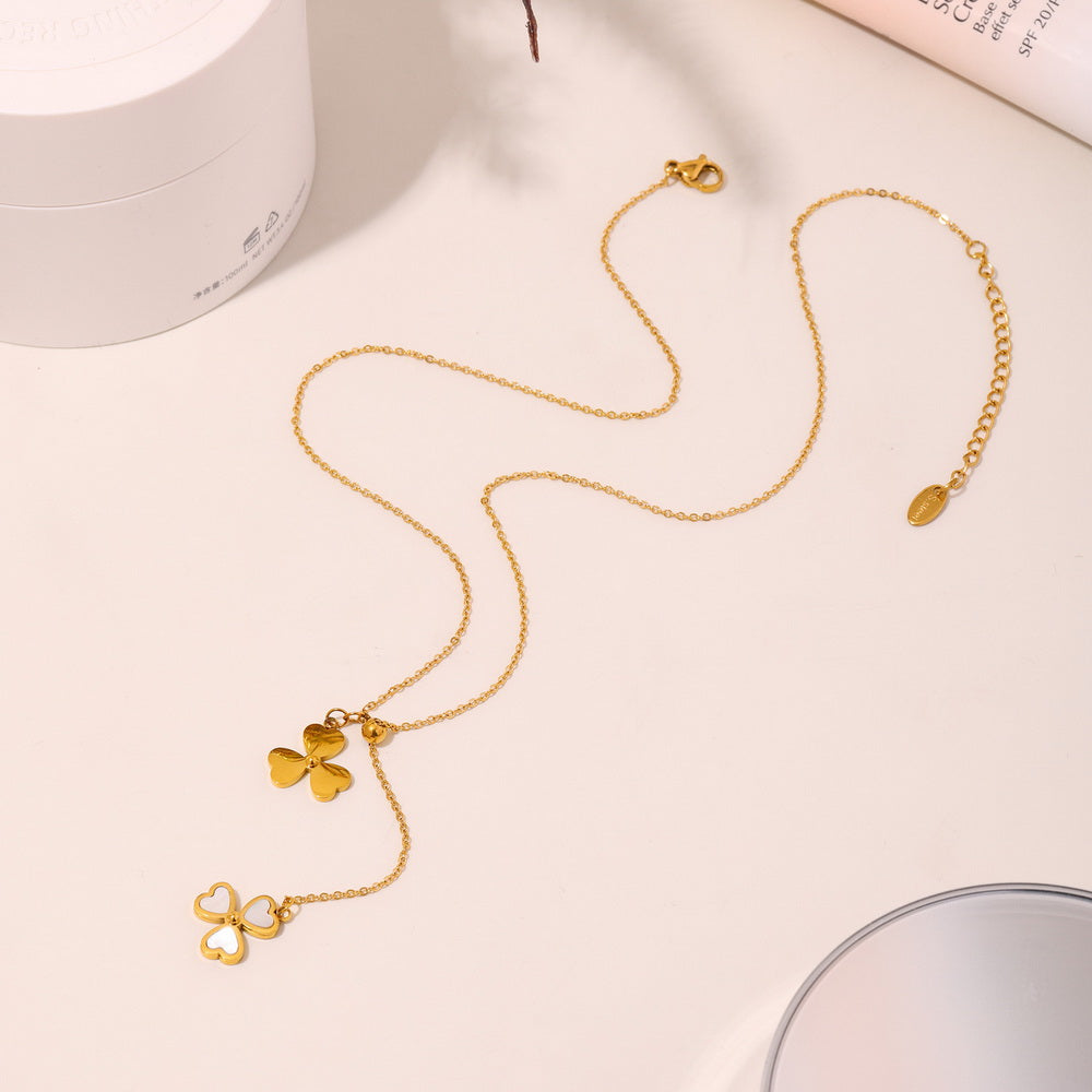 Stainless steel gold-plated natural mother-of-pearl heart-shaped three-leaf flower pendant, pull-out adjustable necklace, collarbone chain