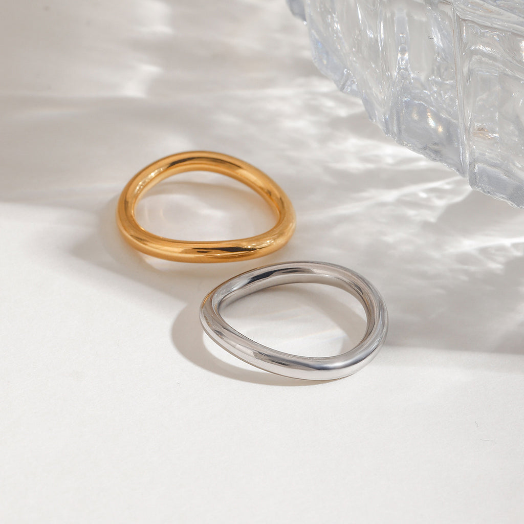 A 2-piece set of stainless steel rings in golden steel color
