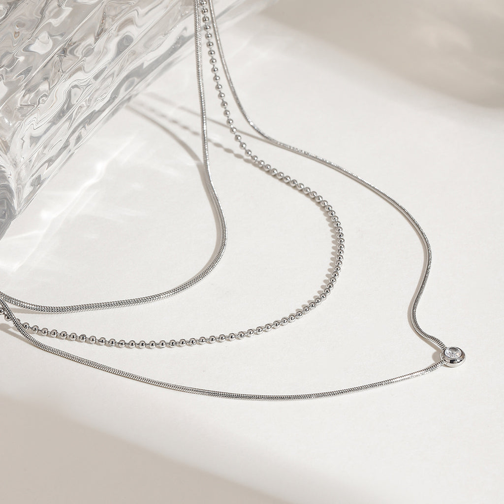 Three-layer titanium steel white rhinestone pendant necklace