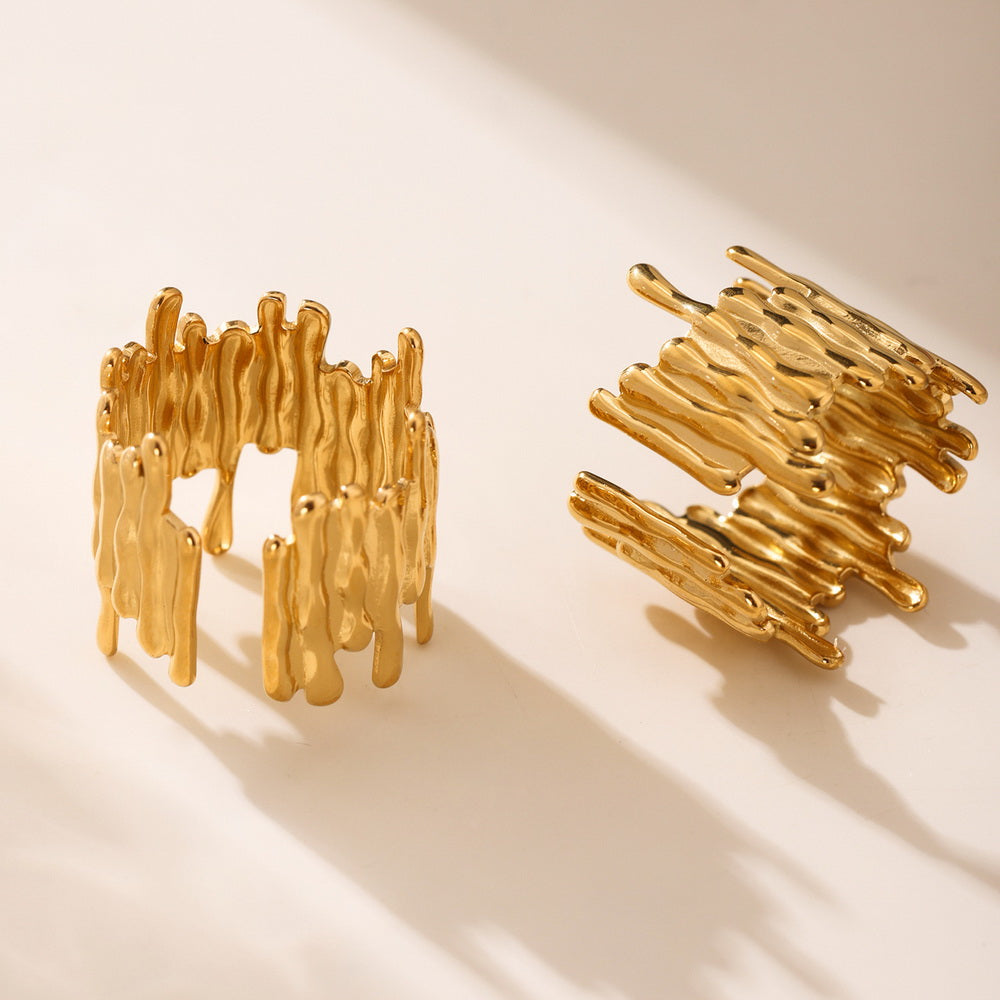 A golden stainless steel cold style irregularly opened ring