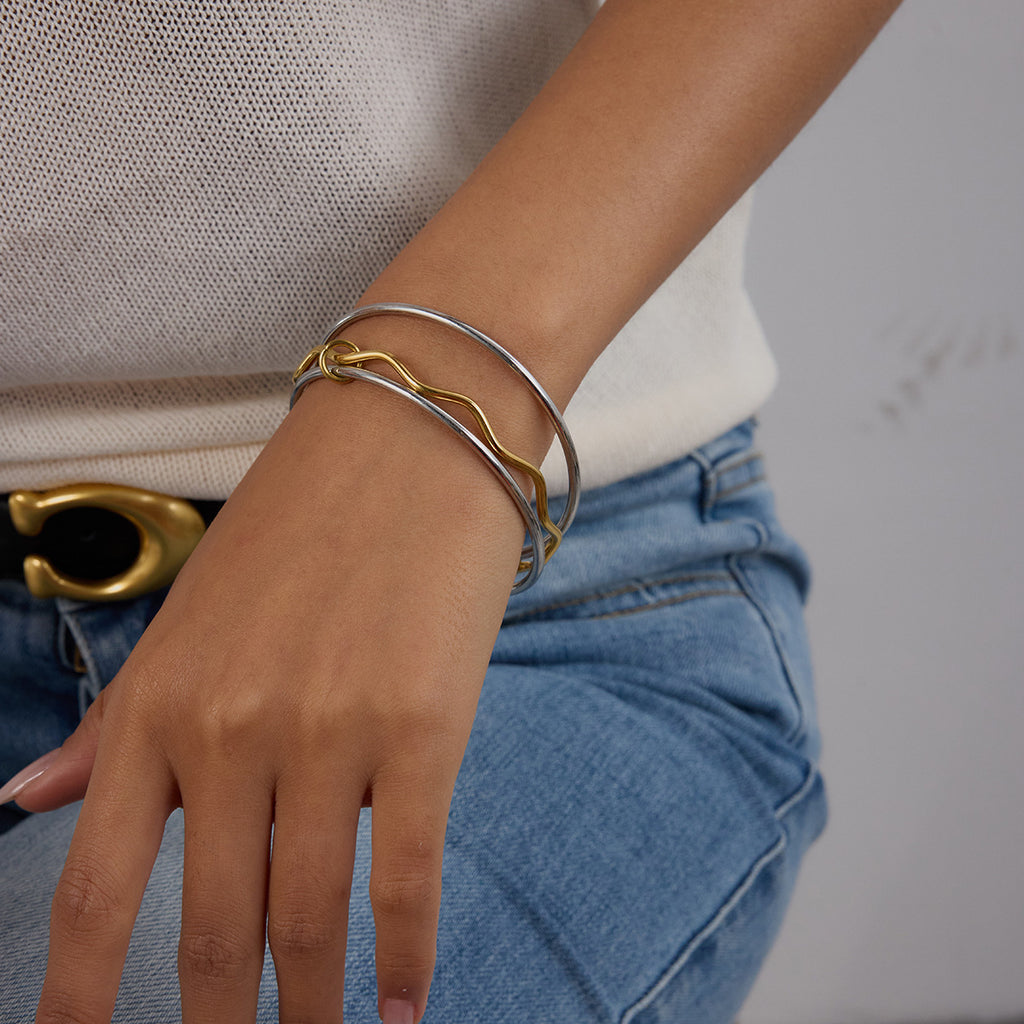 Stainless steel, gold and silver multicolored bracelets can be stacked and worn