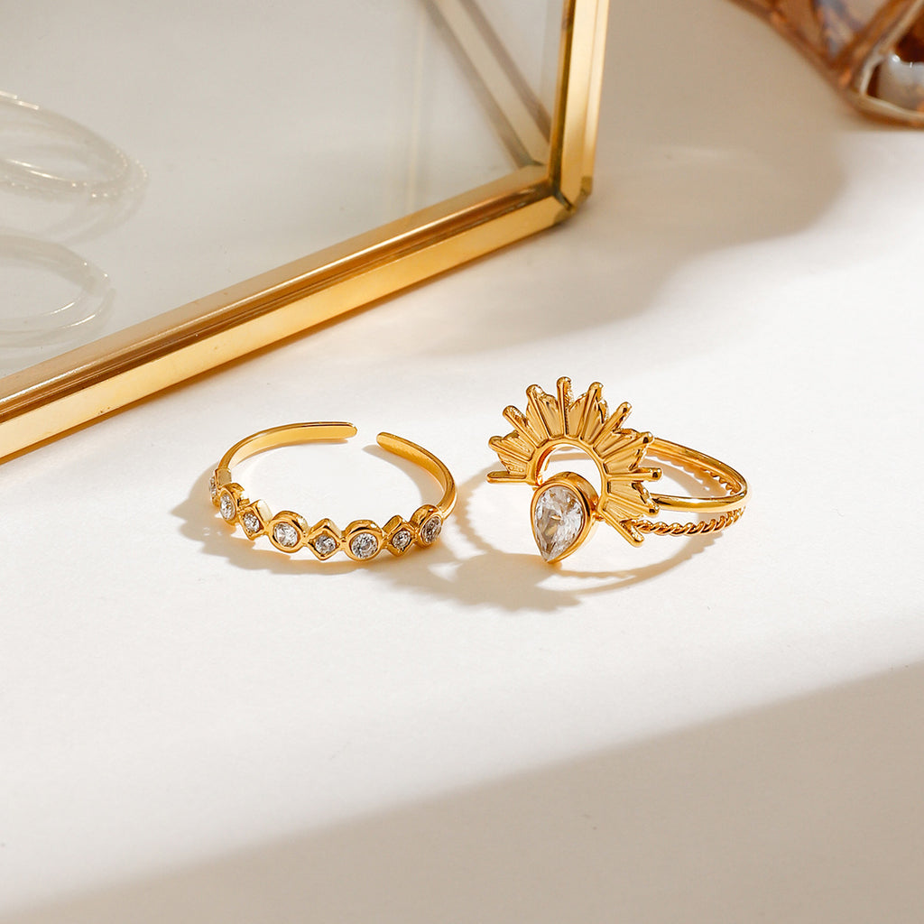A three-piece set of stainless steel zirconium-encrusted rings that can be stacked