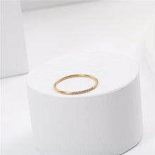 Load image into Gallery viewer, A small diamond-encrusted titanium steel index finger ring plated with 18K gold