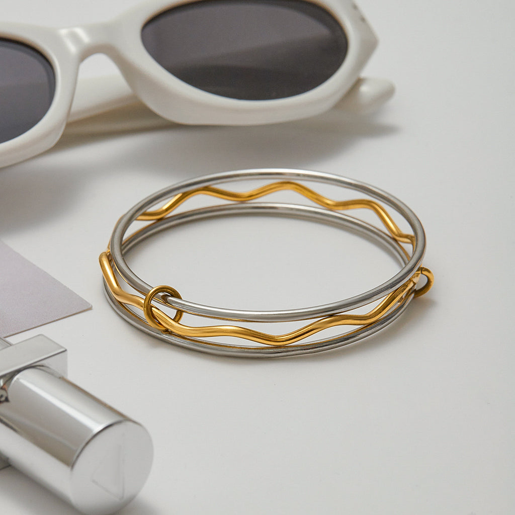 Stainless steel, gold and silver multicolored bracelets can be stacked and worn