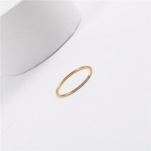 Load image into Gallery viewer, A small diamond-encrusted titanium steel index finger ring plated with 18K gold