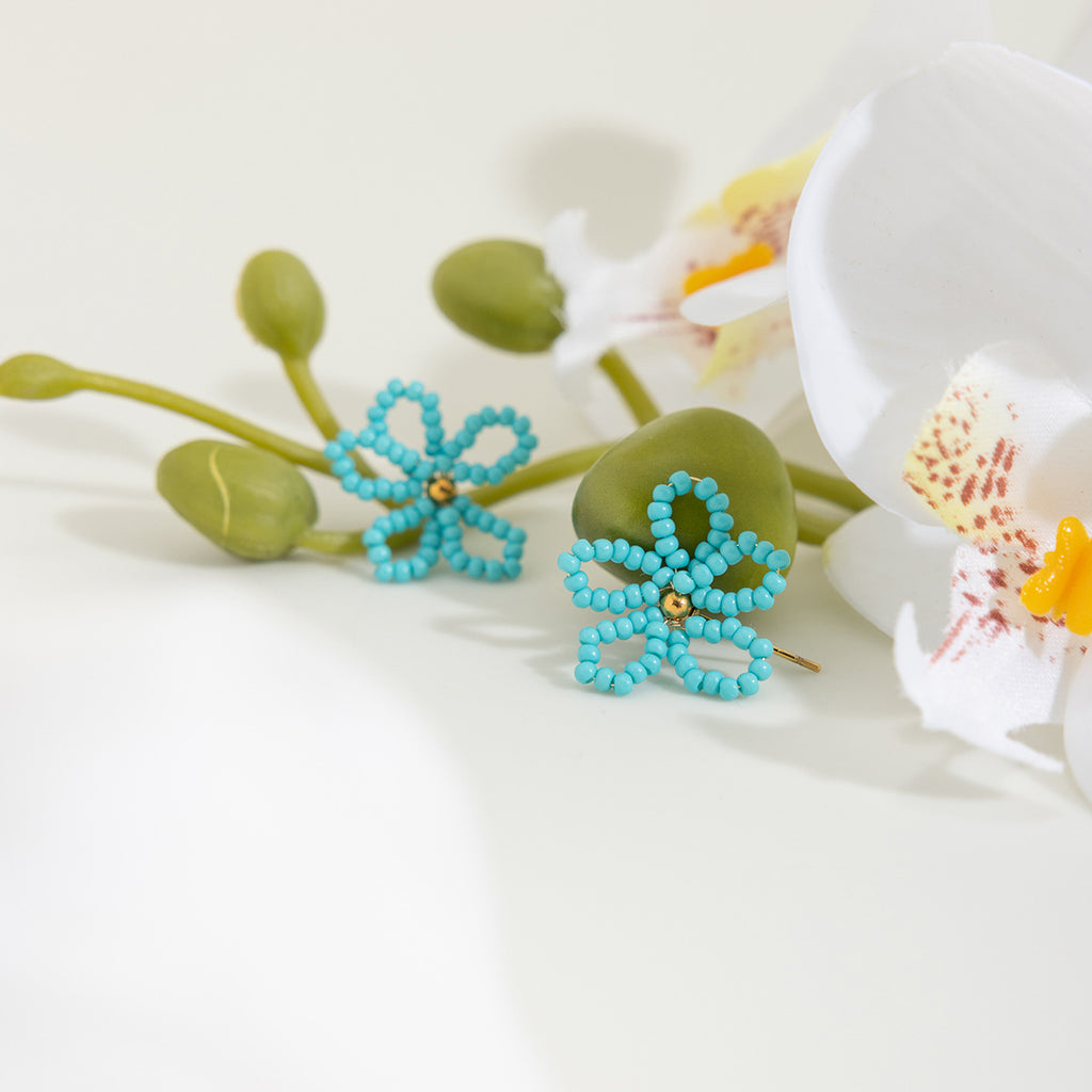 Stainless steel blue rice bead flower earrings