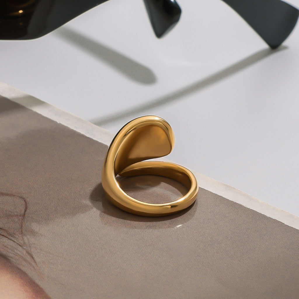 Stainless steel red zircon serpentine ring
