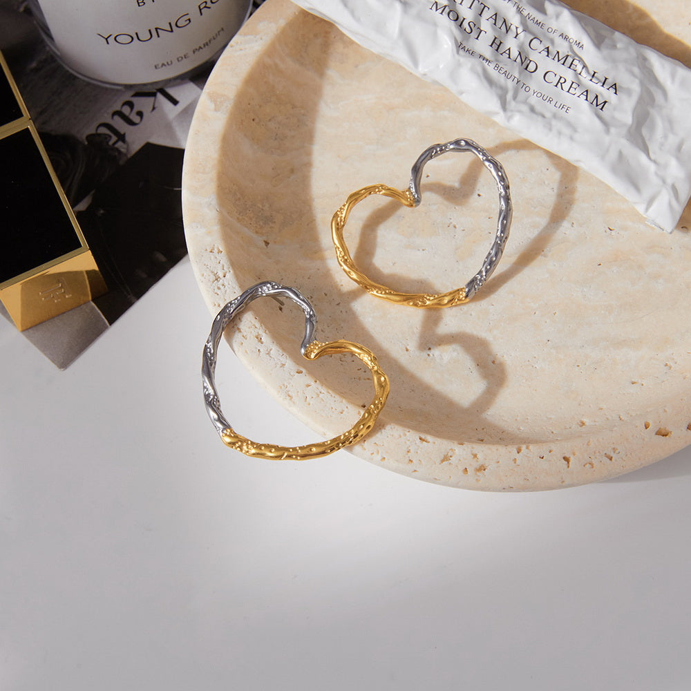 Gold and silver color-matched stainless steel heart-shaped exaggerated ear studs