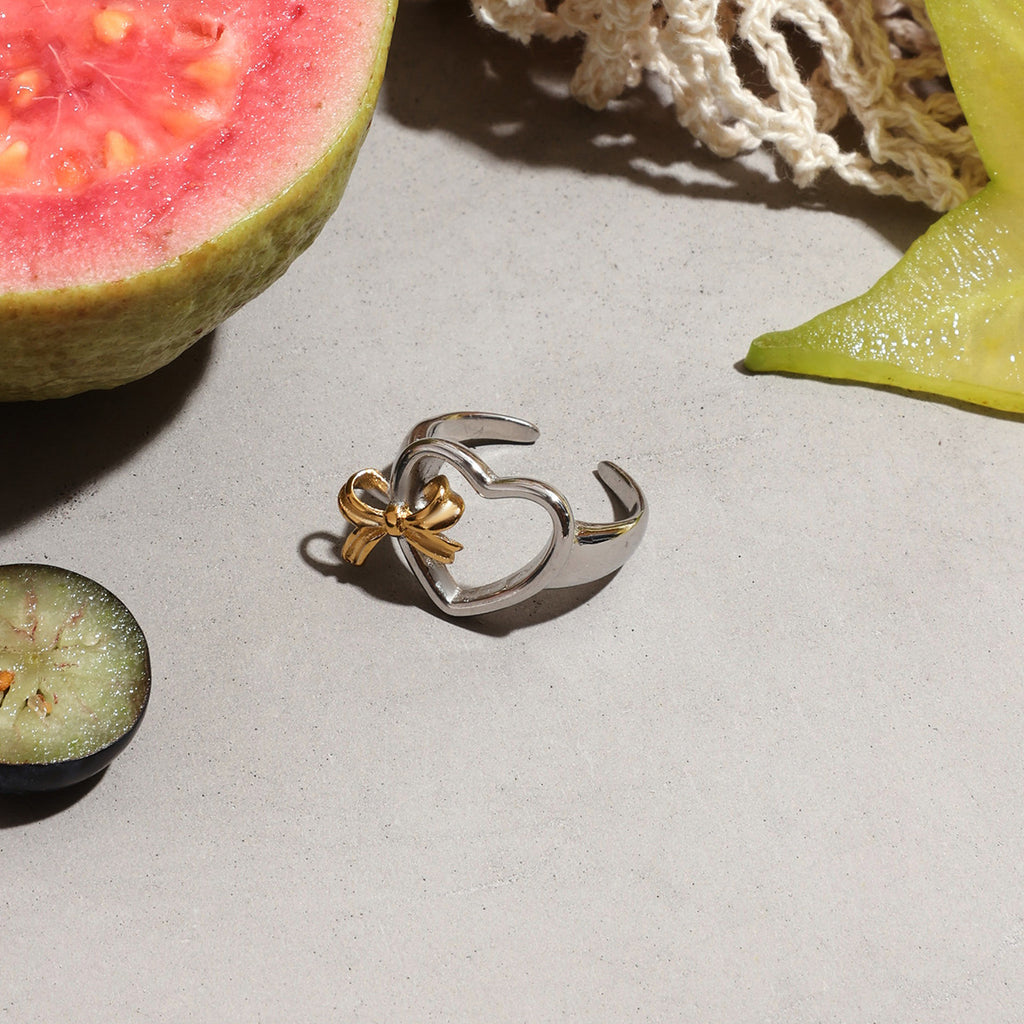 Stainless steel color-blocking hollowed-out heart-shaped bow opening ring