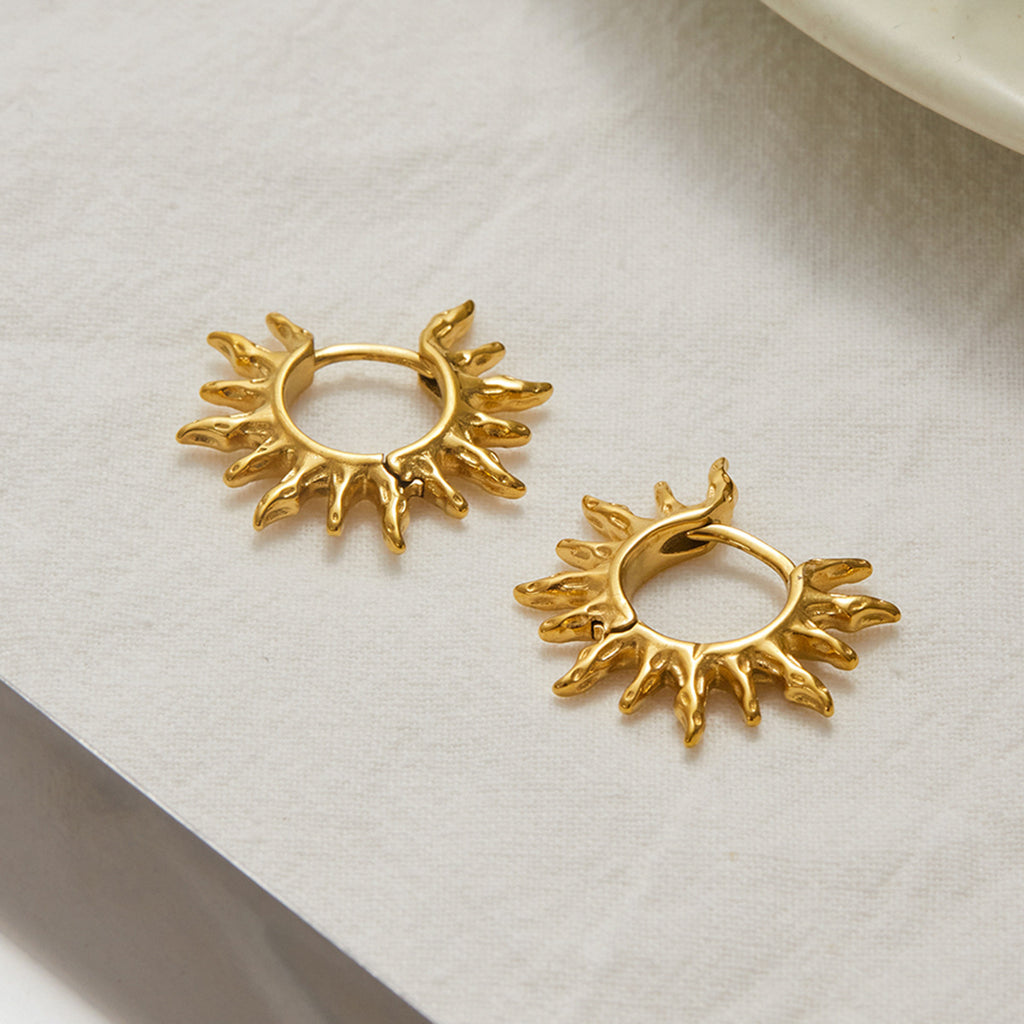 Golden stainless steel sunflower hollowed-out earrings