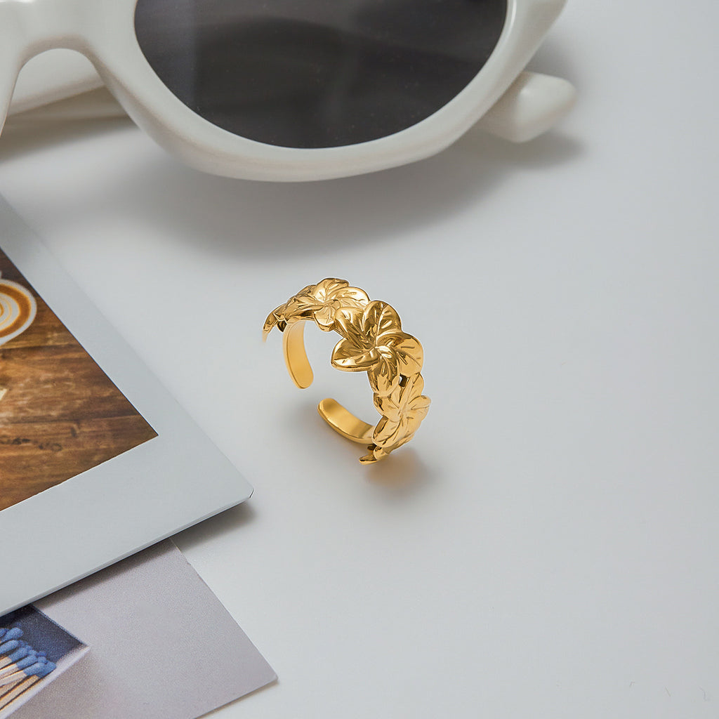 Golden stainless steel flower ring