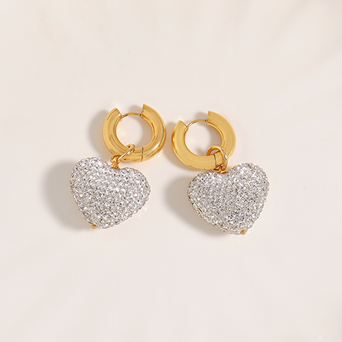Diamond-encrusted three-dimensional heart pendant earrings